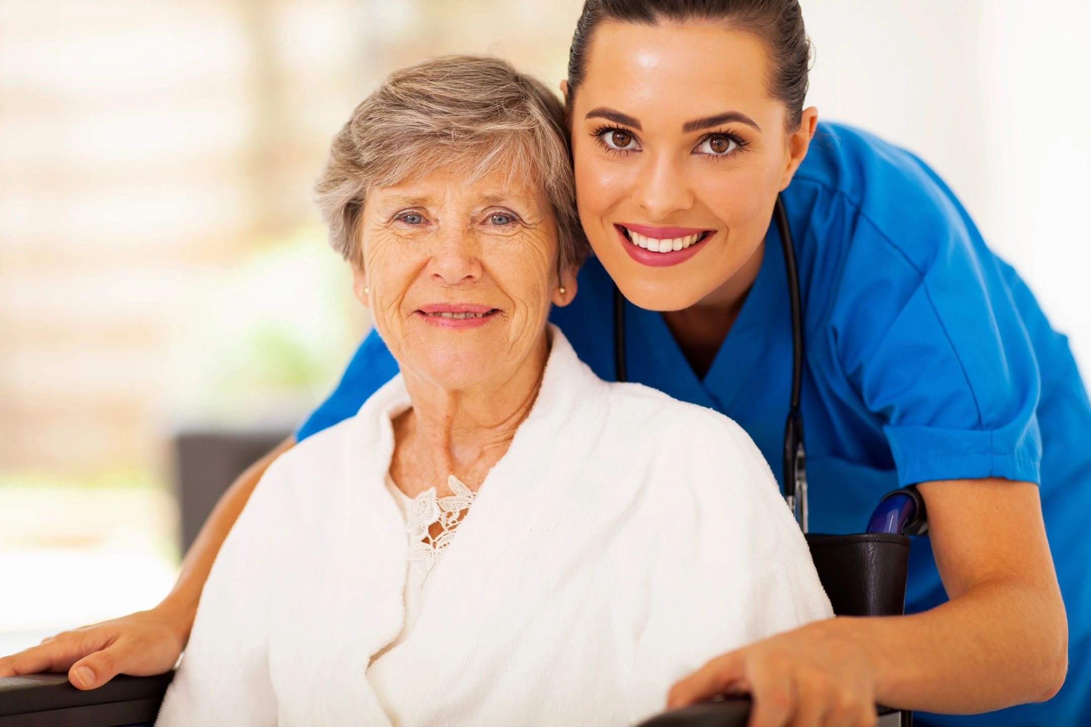 Healthcare worker with elderly patient